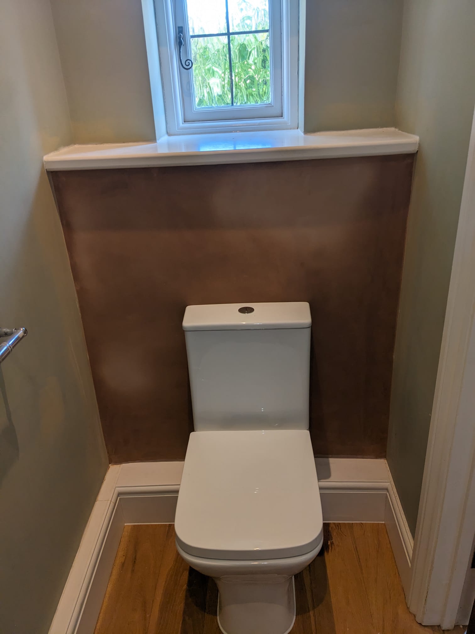Cloakroom toilet boxing-in with a new window sill and skirting